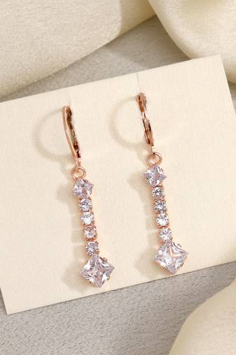 Bring vintage back with white color antique stone earrings in style