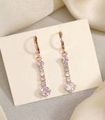 Bring vintage back with white color antique stone earrings in style