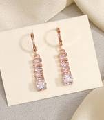 Glowing in elegance: white color antique stone earrings with lush finish