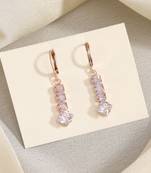 Crafted with care: white color antique stone earrings with elegant accents