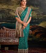 Green silk madhubani & bandhej fusion print saree with unstitched blouse