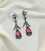 Pink color fashion earrings featuring delicate charm and feminine style