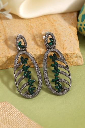 Green color fashion earrings styled for spring and summer wardrobe vibes
