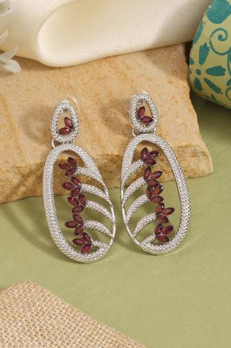 Magenta color fashion earrings that embody luxury and artistic expression