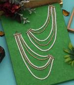 White & gold color antique earrings chain for wedding or festive looks