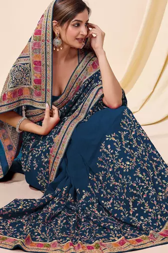 Trendmalls teal Vichitra silk blend embroidered swarovski work saree with unstitched blouse
