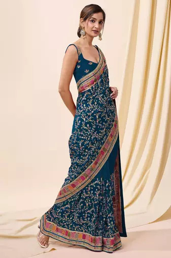 Trendmalls teal Vichitra silk blend embroidered swarovski work saree with unstitched blouse
