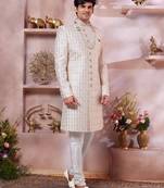 Cream art silk computer thread sherwani and faux satin churidar for men