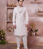 Cream art silk computer thread full sleeve sherwani and faux satin churidar for men