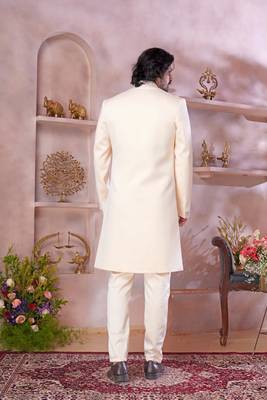 cream imported plain fabric sherwani with faux satin churidar foe men 3