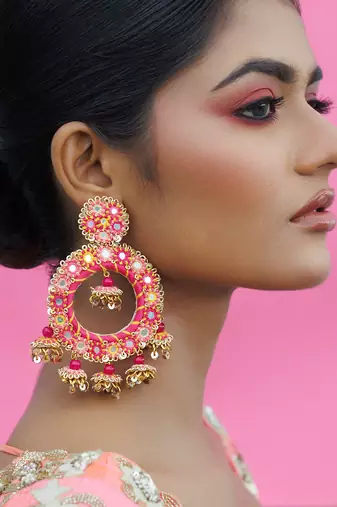 Pink metal based yellow gold plated earrings