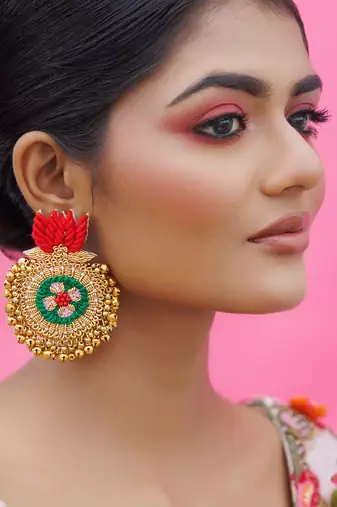 Gold metal based yellow gold plated earrings