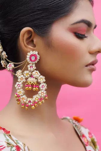 Silver metal based yellow gold plated earrings