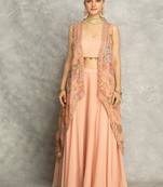 Peach lehenga with embroidered cape and crop top bustier