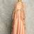 Peach lehenga with embroidered cape and crop top bustier