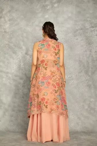 Peach lehenga with embroidered cape and crop top bustier