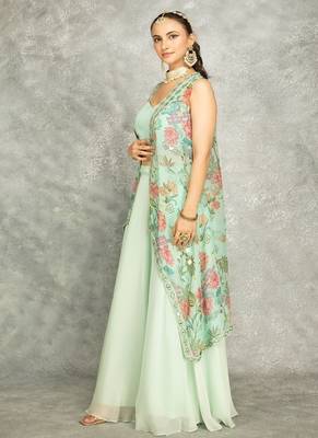 Turquoise lehenga with embroidered cape and crop top bustier 2
