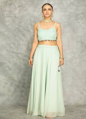 Turquoise lehenga with embroidered cape and crop top bustier 3