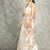 White Lehenga With Embroidered Cape and Crop Top Bustier