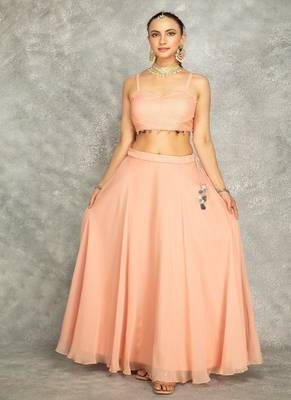 Peach lehenga with embroidered cape and crop top bustier 5