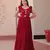 Maroon faux blooming with sequins multithreaded beads embroidered work gown