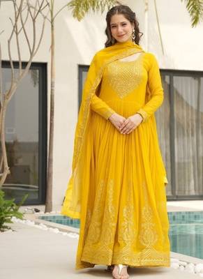 Yellow faux blooming with embroidery zari sequins work gown 2