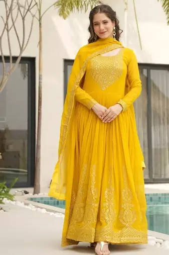 Yellow faux blooming with embroidery zari sequins work gown
