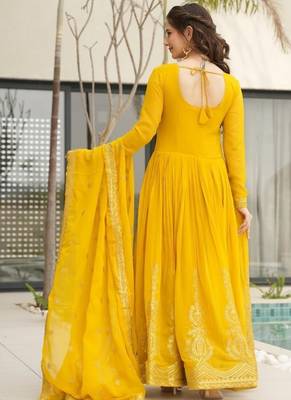 Yellow faux blooming with embroidery zari sequins work gown 3