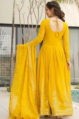 Yellow faux blooming with embroidery zari sequins work gown