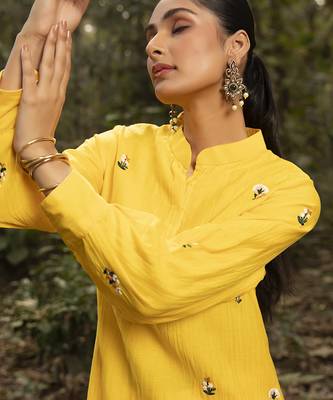 Yellow chanderi silk embroidered kurta and pant 4