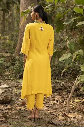 Yellow chanderi silk plain kurta and pant with neck embroidery