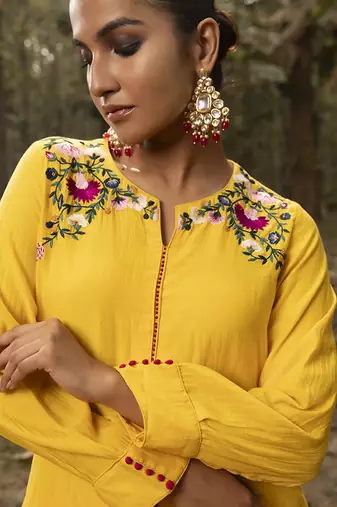 Yellow chanderi silk plain kurta set with neck line embroidery