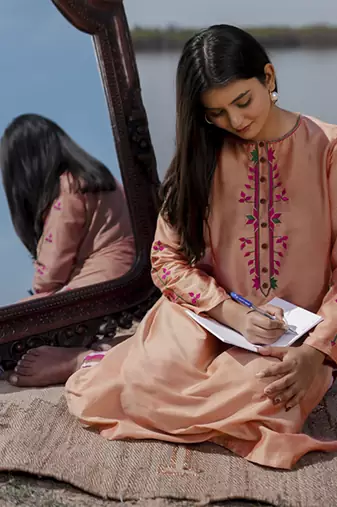 Peach plain floral cotton kurta set with embroidered sleeves