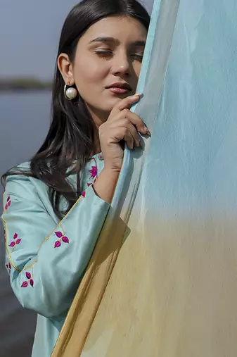 Aqua blue plain floral cotton kurta set with embroidered sleeves