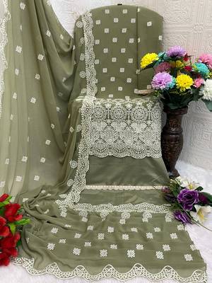 Green color faux georgette fabric embroidery work beautiful occasional wear suit 3