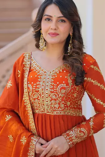 Orange color fendy chiffon fabric elegant embroidered gown with dupatta
