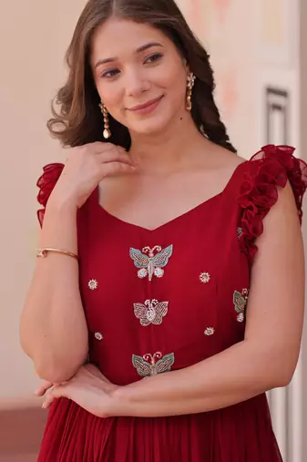 Beautiful and graceful smart partywear goergette maroon color gown for looks