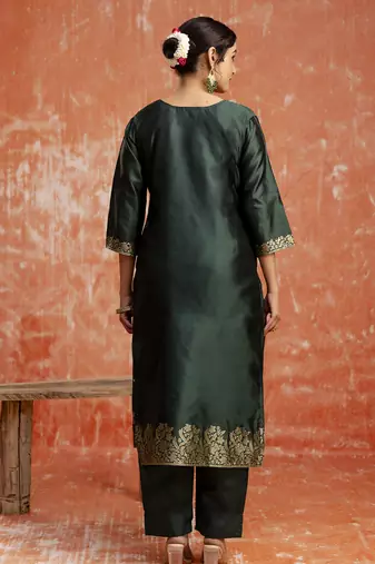 Green color cotton silk blend wevon jacquard jari partywear suit