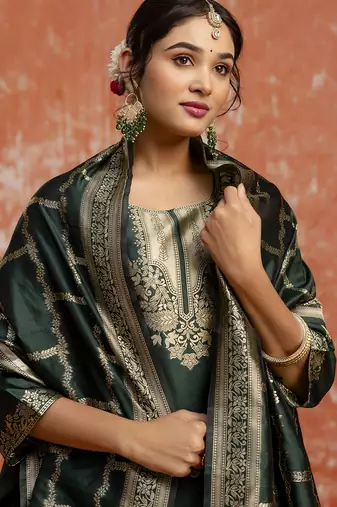 Green color cotton silk blend wevon jacquard jari partywear suit