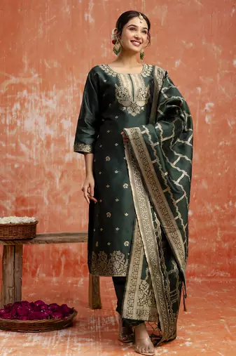 Green color cotton silk blend wevon jacquard jari partywear suit