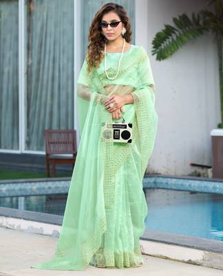 green embroidery sequin border work organza saree 1