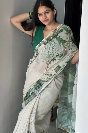 Green tropical printed soft linen saree with handmade tassels and printed blouse