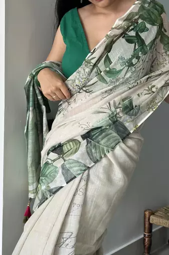 Green tropical printed soft linen saree with handmade tassels and printed blouse