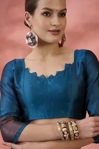 Teal woven zari silk blend saree