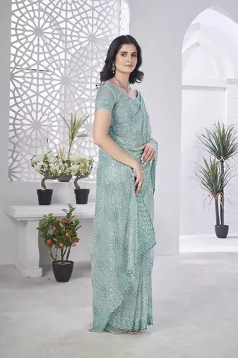 Sea green tissue net sequin multi thread embroidered saree with cut work