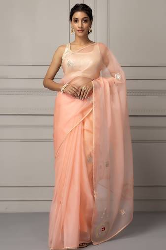 Peach-coloured embellished organza saree