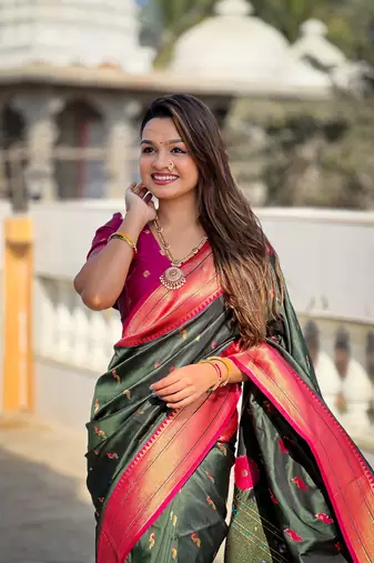 Green paithani art silk blend woven jacquard saree