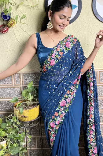 Georgette blue saree with embroidered work