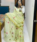 Light green printed cotton saree with blouse piece