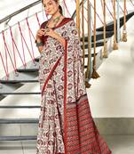 Red printed cotton saree with blouse piece